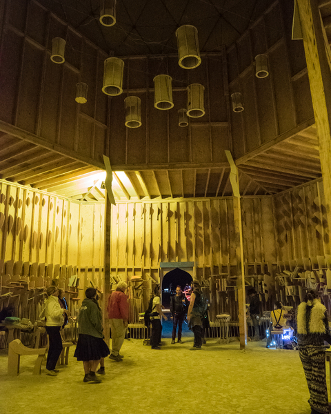 Wide interior shot of the installation at night.